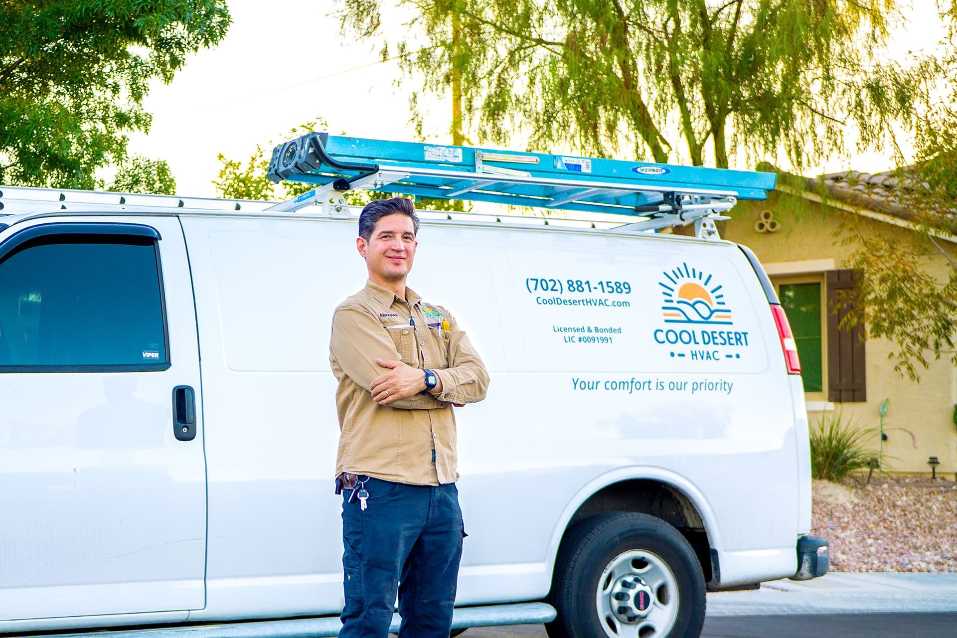 Cool Desert HVAC technician with Las Vegas company vehicle